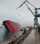В Севастополе во время испытаний получил бортовой крен и опрокинулся у пирса плавкран "Григорий Просянкин"