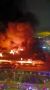 В районе пожара на улица Дыбенко слышны громкие хлопки